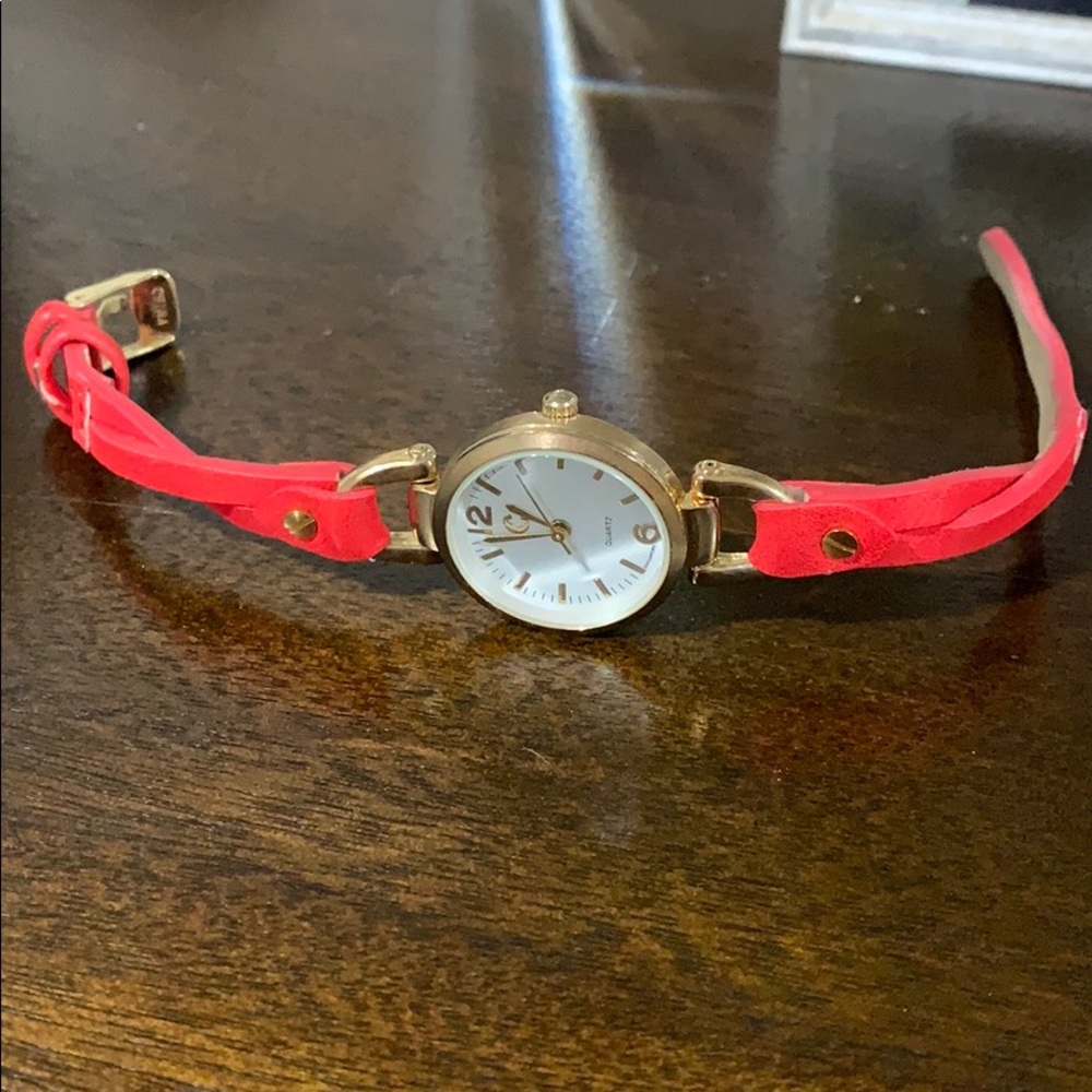 Charming Charlie coral twisted watch.